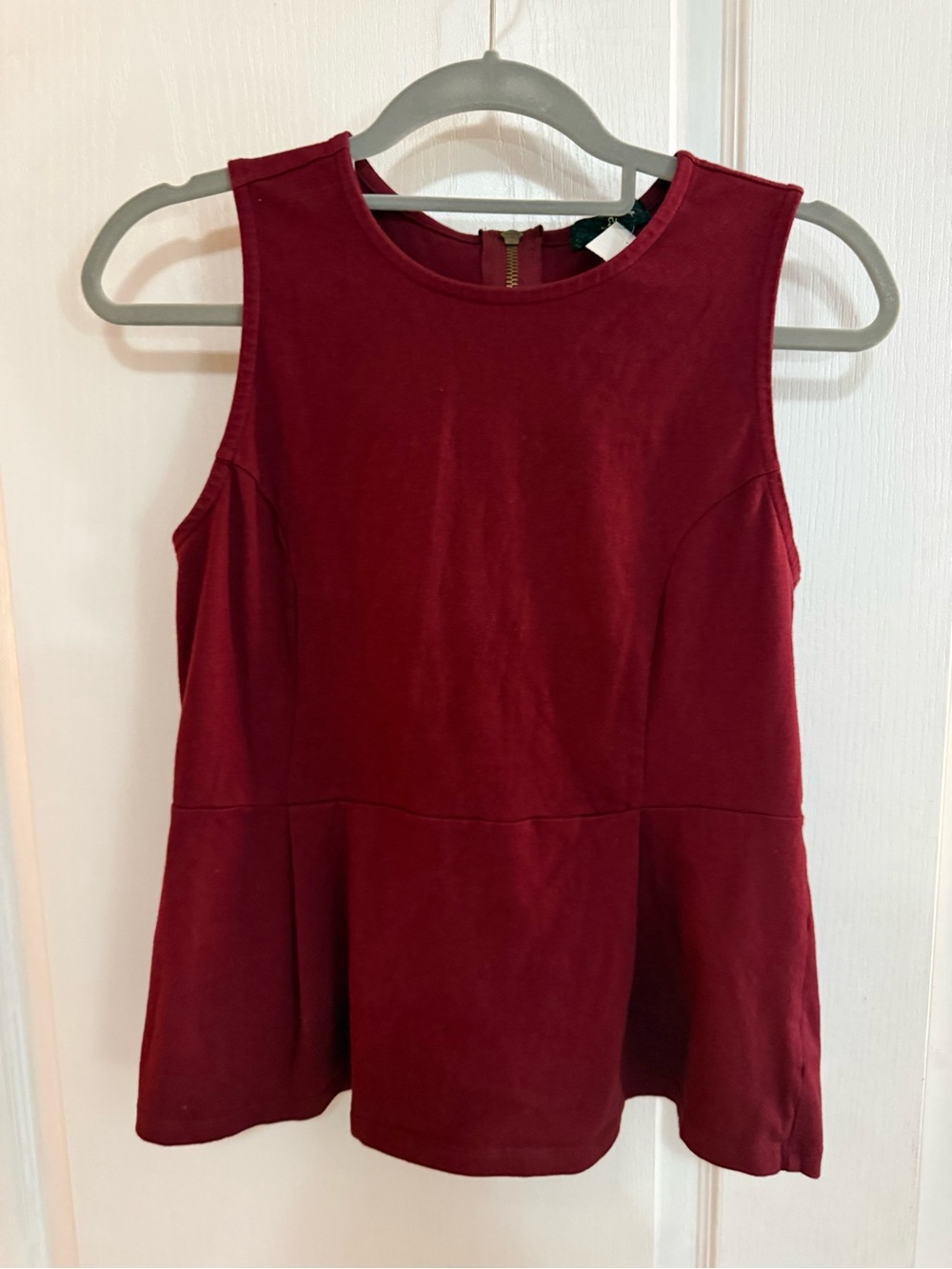 Sleeveless Peplum Tank Top in Wine